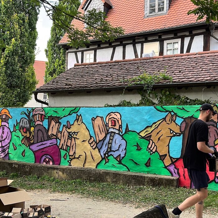 Muro colorato al parco giochi di Schießberg (graffiti): così dovrebbe apparire anche l'ingresso al parcheggio multipiano della stazione